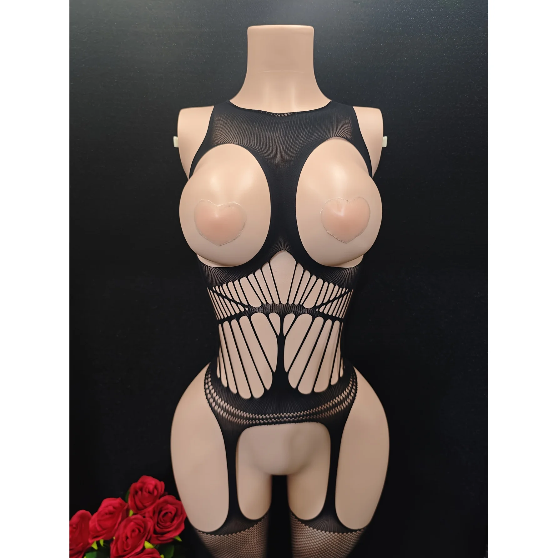 2-Piece Set: Alluring lace bodysuit featuring a sheer design with cutouts, a sheer mesh dress, and fishnet stockings.