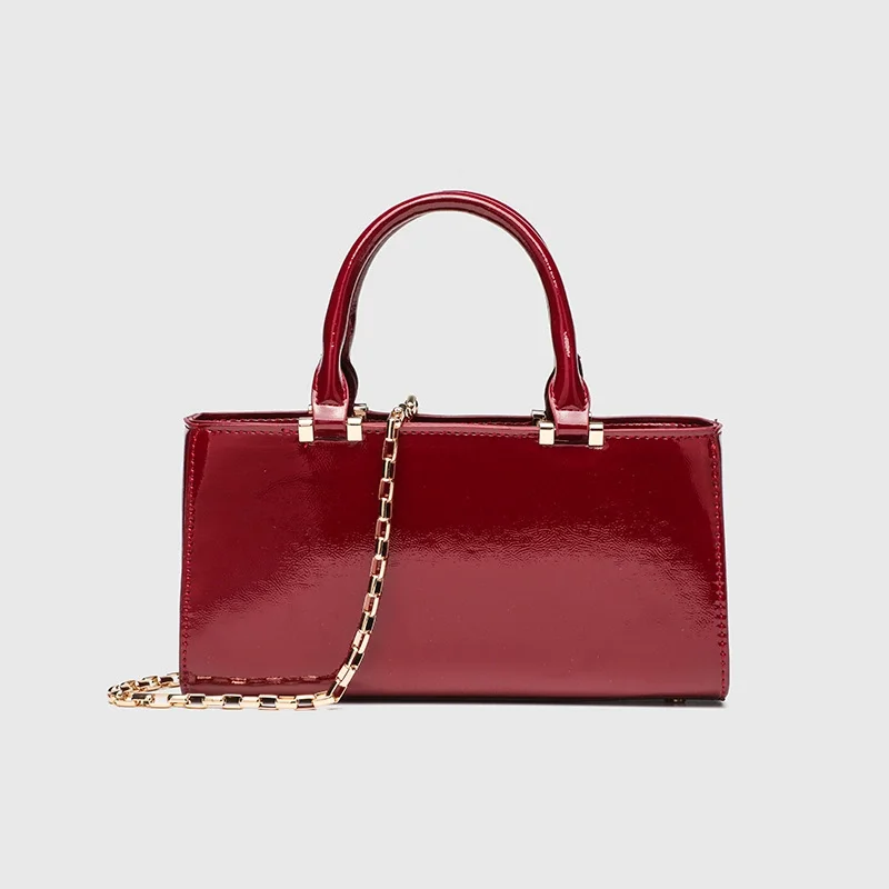 

Красная кожаная сумка женской формы с замком, сумка-мессенджер с металлической цепочкой, легкая роскошная нишевая сумка