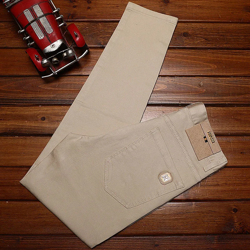 Jeans men's summer slim fit small feet simple and versatile elastic khaki fashionable trend business pants