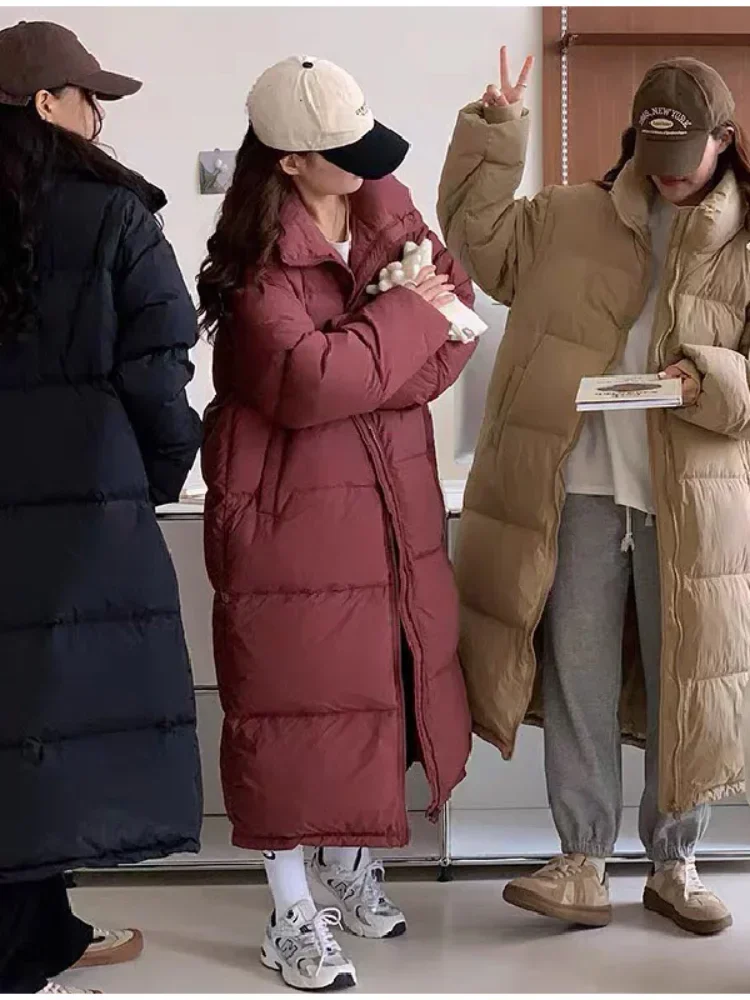 Übergroße lange Mantel Frauen Winter Daunen Baumwoll jacke weibliche koreanische Mode gepolsterte Mantel Damen lässig dicke warme Reiß verschluss Mäntel