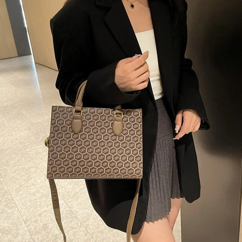 

Elegant Classic Ladies Leather Handbag With Crossbody Strap By Famous Designer Luxury Brand For Stylish Women