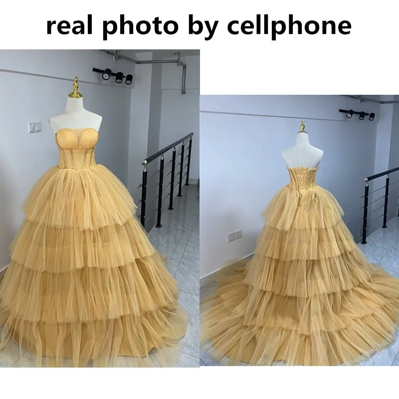 Fashion Tiered Vestidos De Quinceaneras 2023 New Yellow Tulle Ball Gown Sexy scollo a v senza maniche semplice Vestido De debuttante