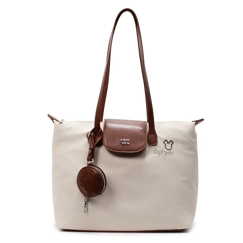 

Leisure nylon canvas bag female 2025 new tide fashion Korean Tote simple hundred with large capacity commuting shoulder bags