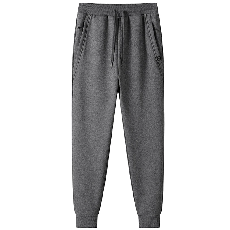 秋冬カップル向けテーパードスウェットパンツ、トレンドカジュアルロングパンツ、メンズパンツ、ユースフリーステーパードパンツ、メンズスウェットパンツ