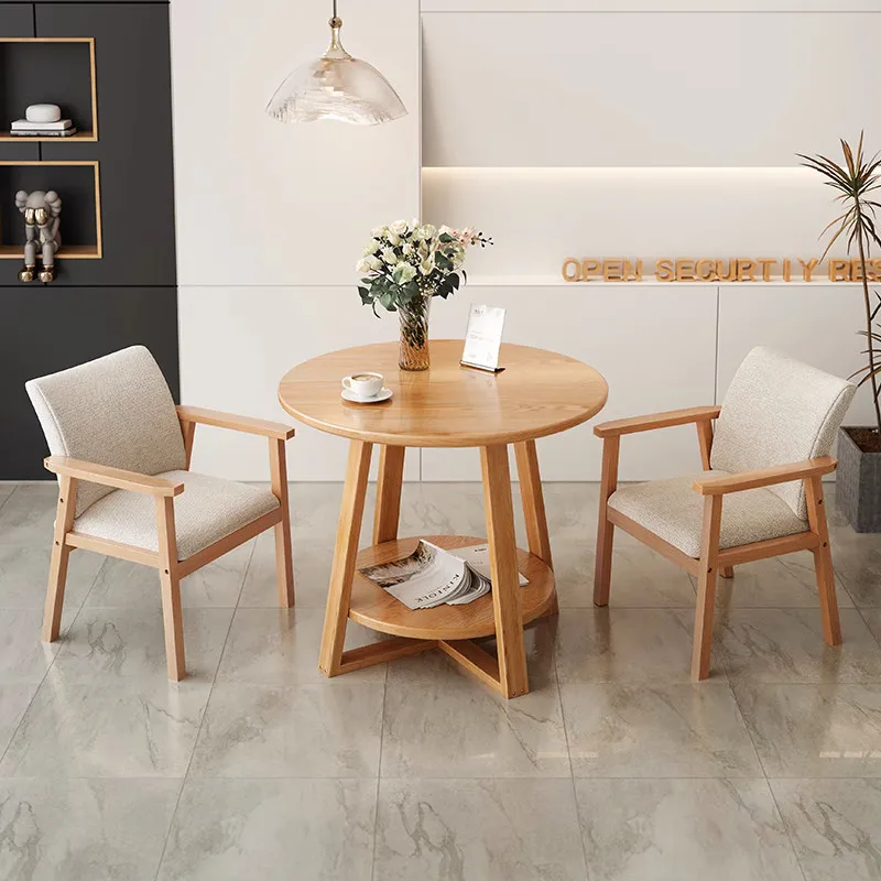 Massief houten poot kleine ronde tafel onderhandeling casual commerciële salontafel en stoel combinatie moderne eenvoud