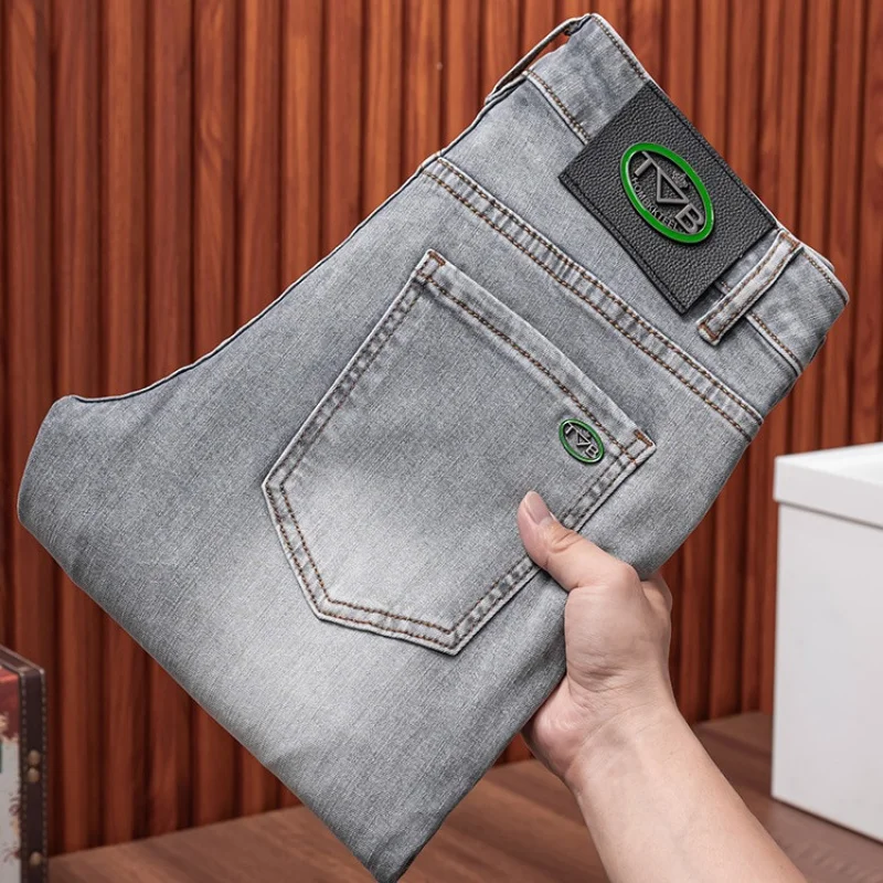 Jeans simples cinza puro e high-end masculino, calça justa e estica, nova marca de moda, primavera e verão, 2024