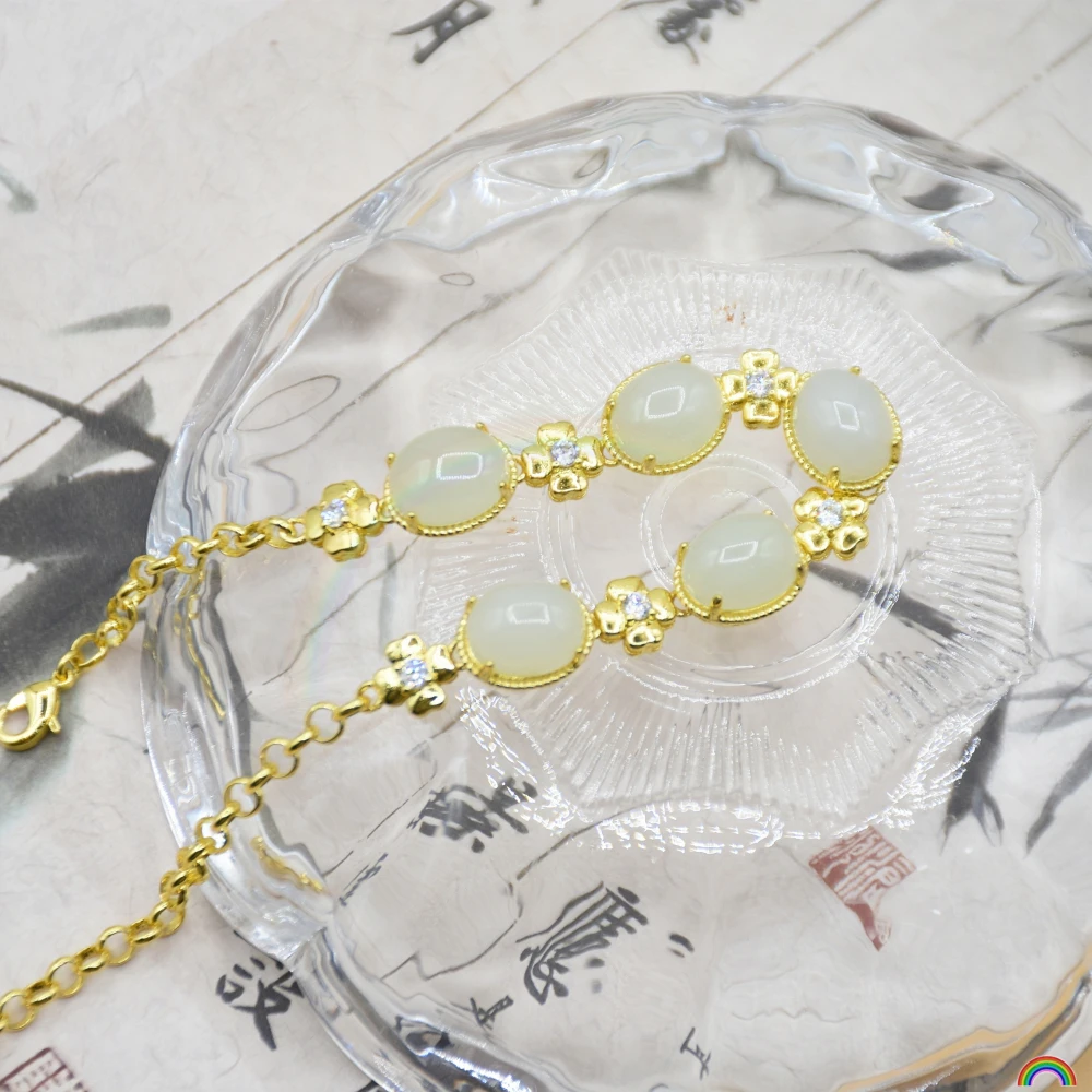 

Natural Hotan Jade Bracelet Alloy Inlaid Egg Jade Jewelry Temperament Flower Hollow out Rwbuy Brand Design