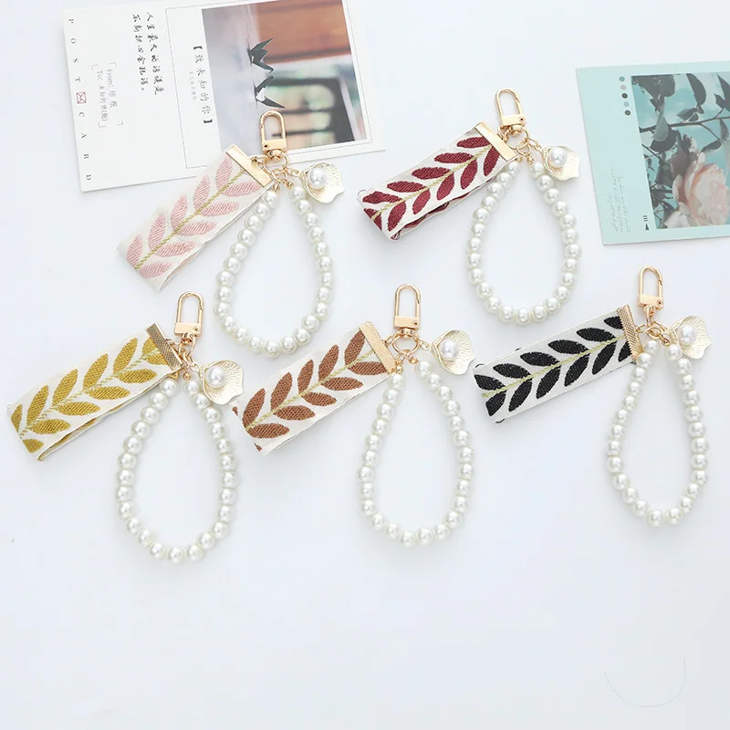 

Fashion Cherry Blossom Love Rabbit Charm Pendant Car Bag Keyring Simple Pearl Striped Ribbon Keychain New Jewelry for Women's