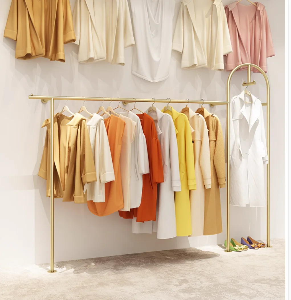 Clothing store display shelves for children's wear and women's wear on the wall floor double hanging clothes hanger