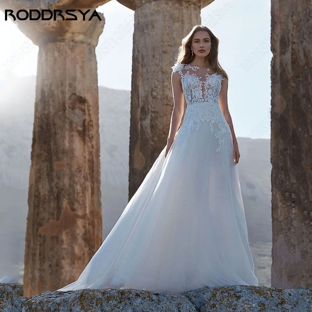 RODRSYA Lace Vestido de Noiva Sem Mangas Praia Appliques Ilusão Backless Vestido CustoRODDRSYA Lace Vestido De Noiva Sem Mangas Praia Apliques Ilusão Backless Vestido Custom Made A Linha de Tule Botão vestidos de novia