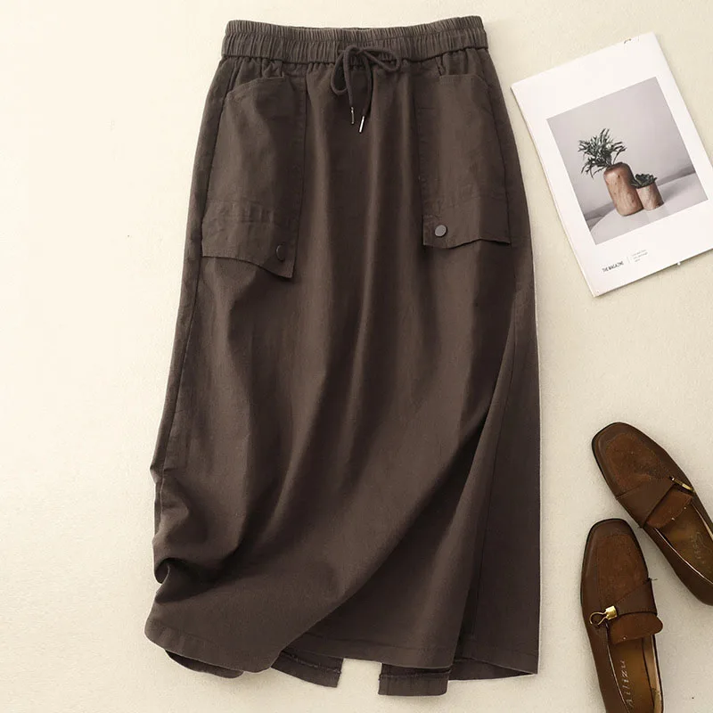 Modne koreańskie spódnice damskie na wiosnę i lato 2025, z dużymi kieszeniami, midi, eleganckie, z wysokim stanem, codzienne, elastyczne, uniwersalne.
