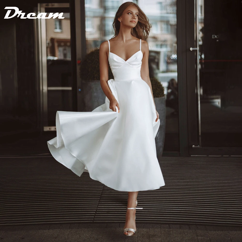 DREAM-vestido de novia sencillo de satén, personalizado, largo hasta el té, tirantes finos, bolsillos para novia, cuello en V, sin mangas, elegante, 2025