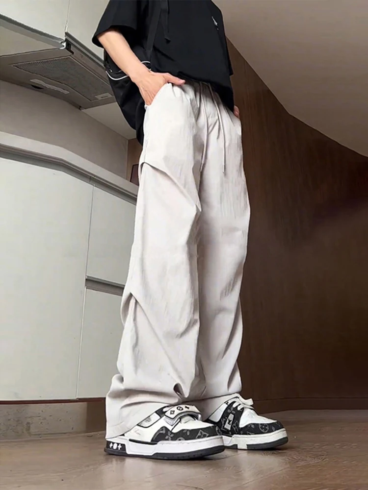 

Qui Dry Ice Silk Men's Summer Casual Pants Loose Wide Leg Trousers Draped Umbrella Soldier Workwear in Beige Straight Cut