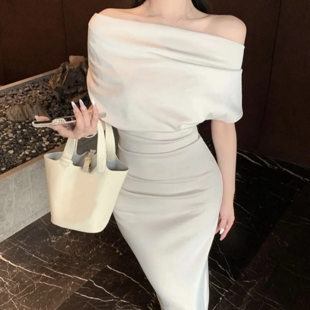 Lange schuine schouder lange jurk effen kleur off-shoulder slim fit lange rok Franse zoete beige abrikoos Koreaanse stijl jurk club