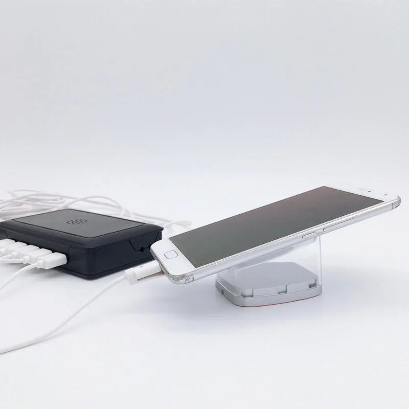 Multiway cell phone alarm and charging display holder for mobile phone tablet security exhibition