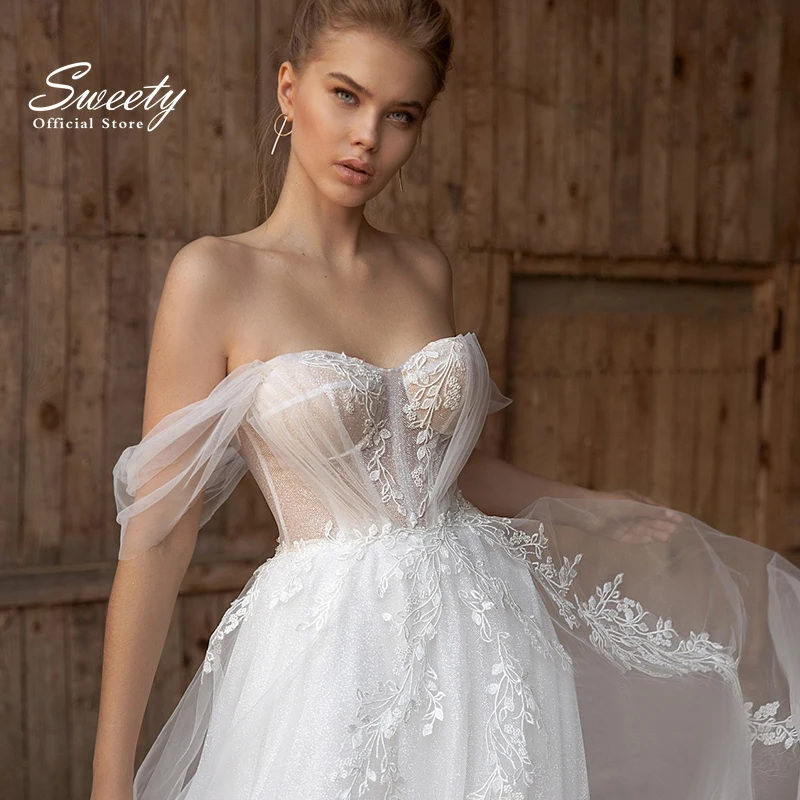 Robe de mariée de luxe en Organza soyeux, tenue de bal de princesse, col bateau, sans manches, avec fermeture éclair à l'arrière, avec des appliques