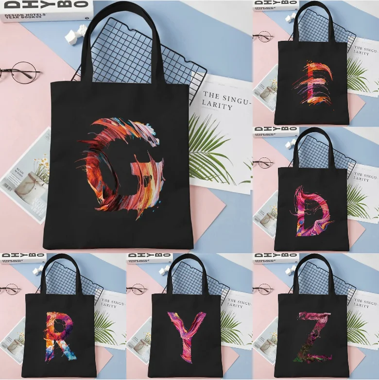 

Colorful Abstract Letter Printed Canvas Shoulder Bag Black Handbag Art Design Suitable for Women's Fashion Leisure DailyShopping