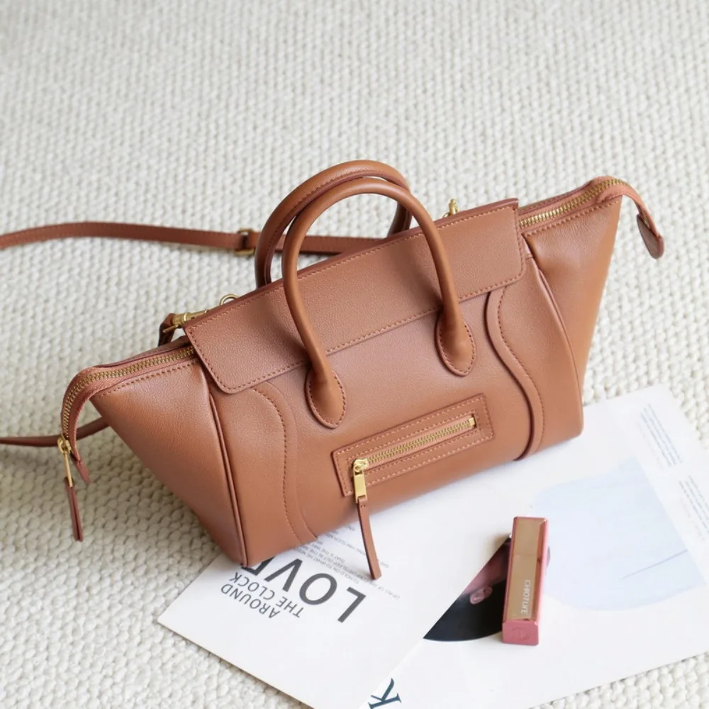 

New Leather Women's Bag Retro Simple Portable Straight Zipper Smiley Face Wing Bag Large Capacity Commuting Texture Fashion