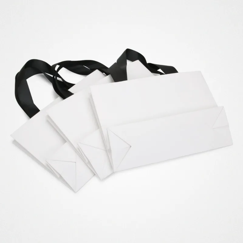 10 pz 250g sacchetto di imballaggio in cartone bianco di alta qualità regalo abbigliamento borsa Shopping sacchetto di carta portatile personalizza