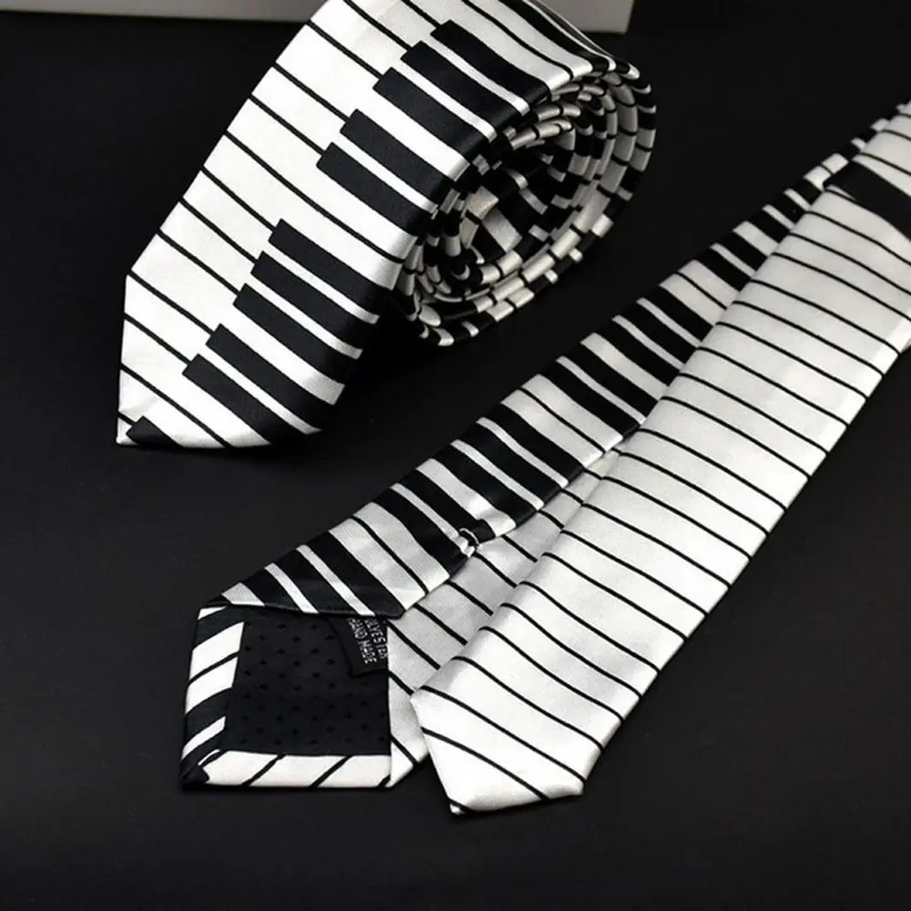 Laço preto e branco do teclado do piano clássico, gravata, laço musical casual