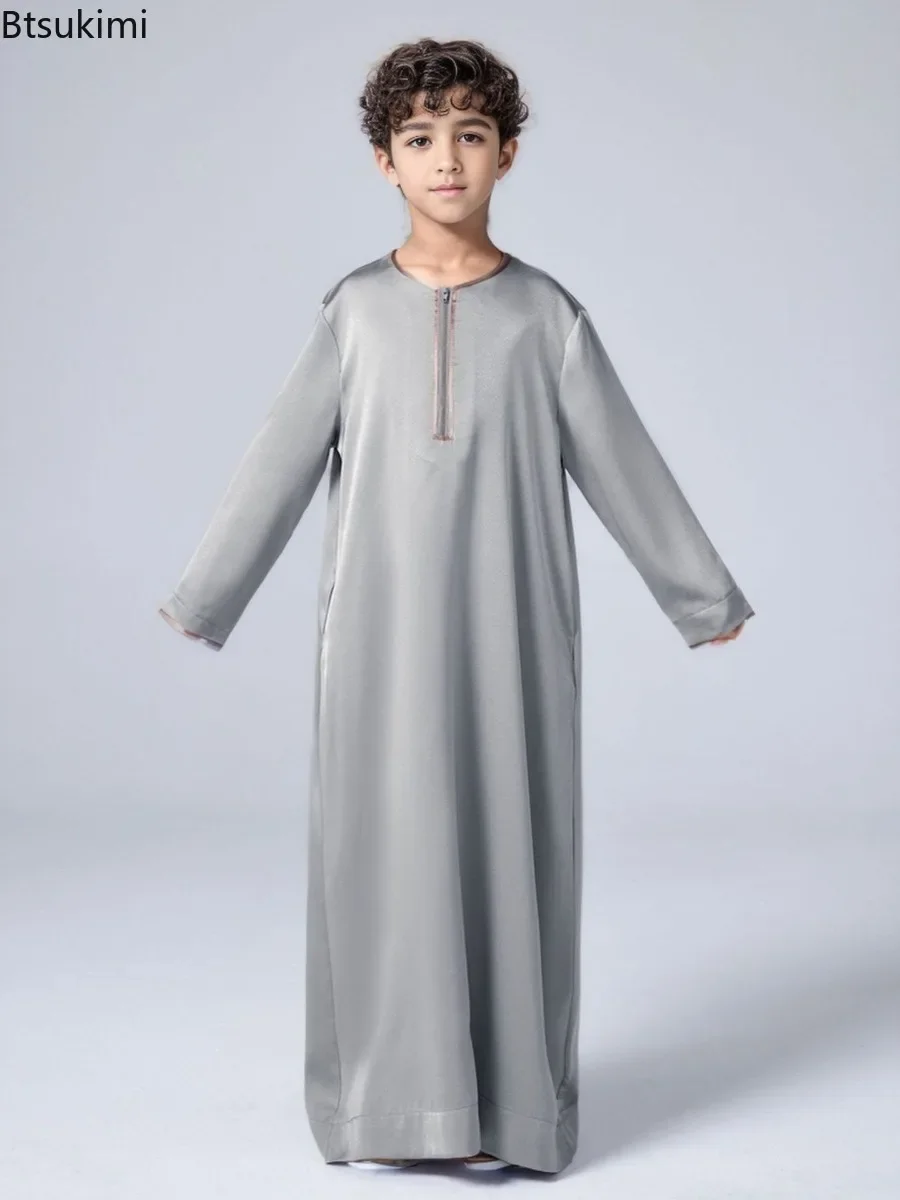 

2025 Muslim Fashion Abaya for Kids Solid Color Satin Long Sleeve Robes Middle East Arab Islamic Clothing Boys Simple Thobe Dress