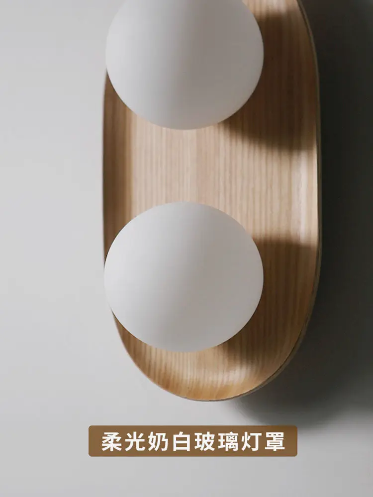 Cream double-headed round glass wall lamp Minimalist designer living room background wall lamp Bathroom spherical bedside lamp