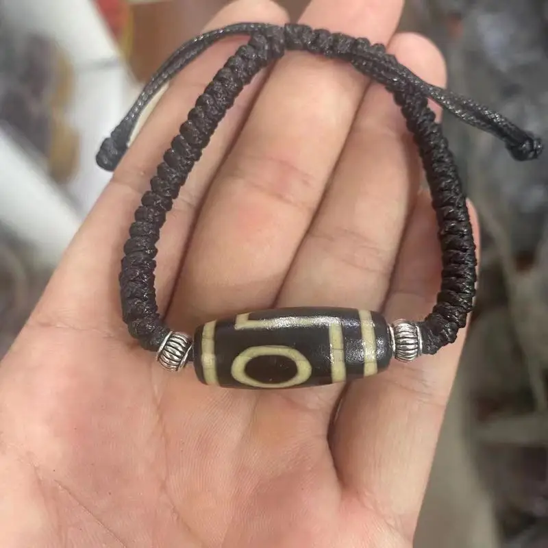 Vintage nine-eye Dzi bead bracelet, single-strand, featuring weathered agate and a treasure bottle design, Tibetan-style wealth