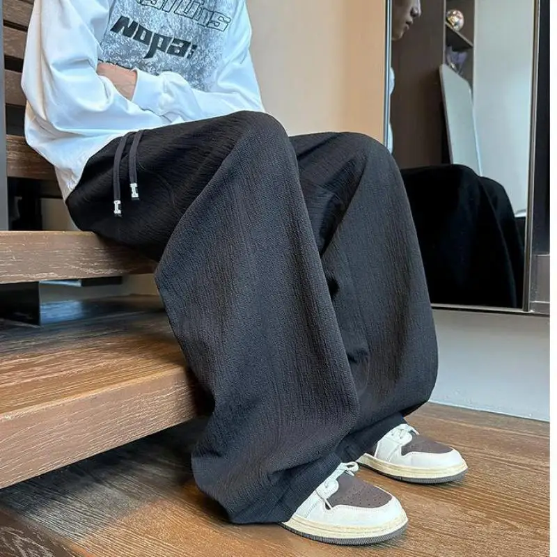 กางเกงวอร์มชายไซส์ใหญ่ M-XXXXXL สีพื้น ชายโค้ง ทรงหลวม สไตล์จ็อกเกอร์ มีเชือกผูกเอว สำหรับฤดูใบไม้ผลิและฤดูใบไม้ร่วง