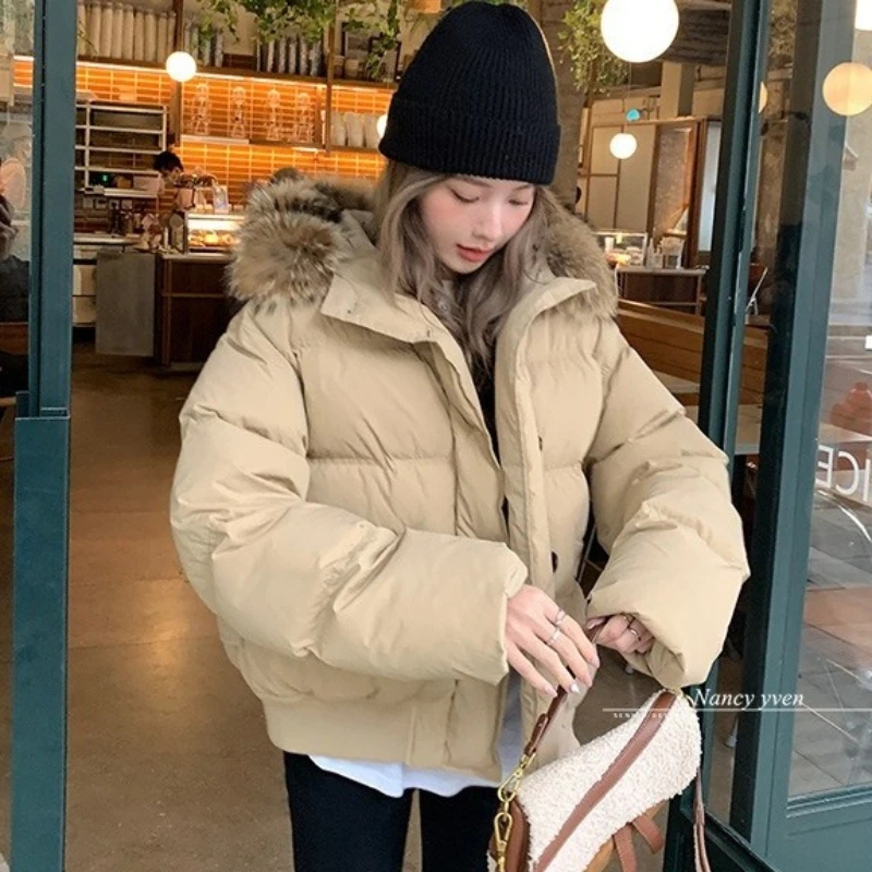 Parka invernale da donna 2025 Casual coreano Lady Capispalla Temperamento Addensare Grande collo di pelliccia Con cappuccio Piumino da donna in cotone