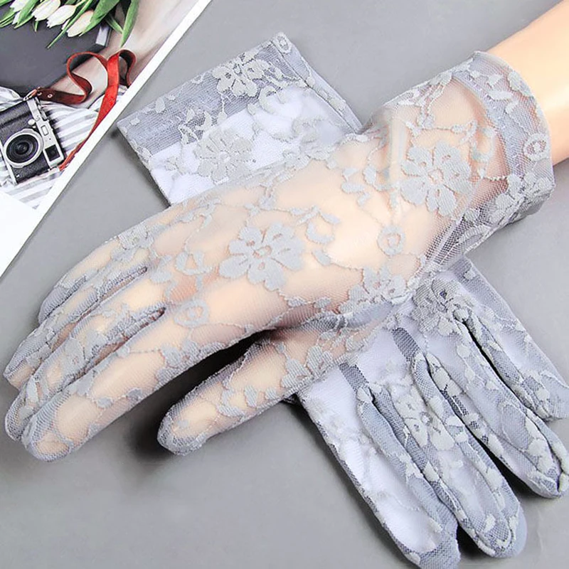 Guantes de mujer de verano de encaje corto transpirable estilo fino guantes de moda suaves coreano elegante conducción al aire libre guantes de protección solar