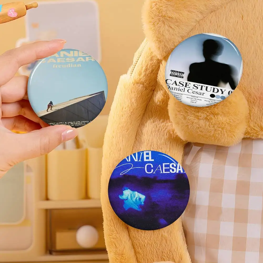 opular Singer D-Daniel Caesar Anime Button Pin Handmade Brooch For Clothes Cartoon Badge Backpack Decoration Jewelry Accessories