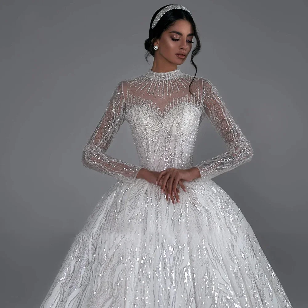 Abito da ballo di lusso personalizzato Abito da sposa Manica lunga alta Scollo a V Abiti da sposa Applicazioni in pizzo Abbigliamento da donna con perline