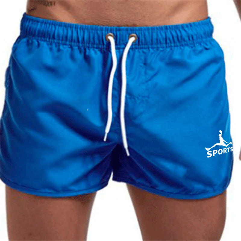 Pantalones cortos transpirables de secado rápido monocromáticos para hombre, pantalones deportivos informales, fitness, playa, surf, nueva moda de verano