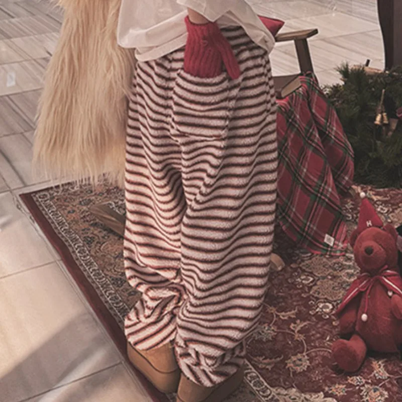 Pantaloni casual in pelliccia di agnello elastica a vita alta chic modello a righe da donna pantaloni lunghi coreani a gamba dritta autunno inverno