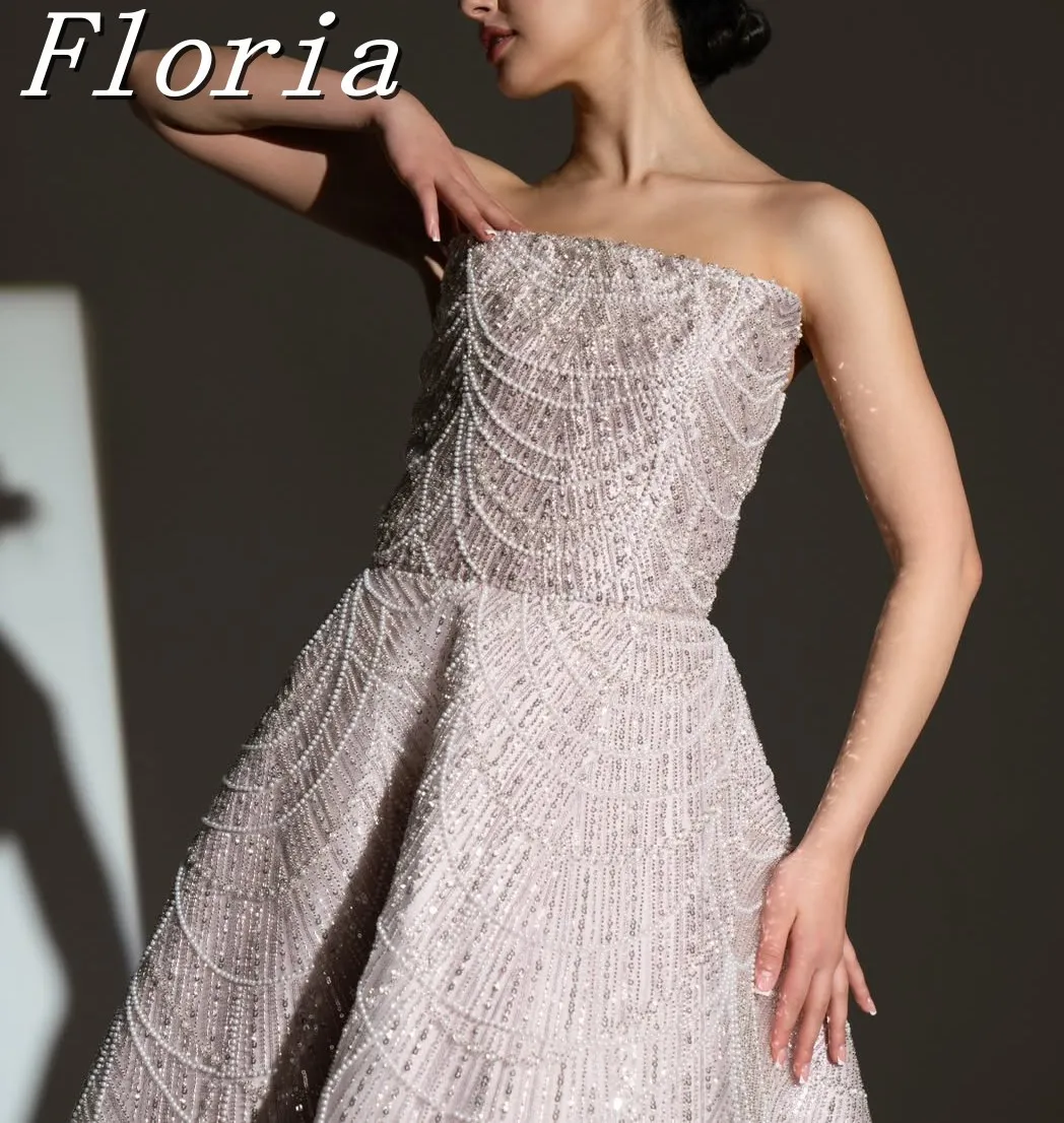 2025 สีชมพูไข่มุกพู่งานแต่งงานชุดเต็มประดับด้วยลูกปัดเจ้าหญิงพรหมชุดหรูหราที่กําหนดเองปิดไหล่ Haute ชุด