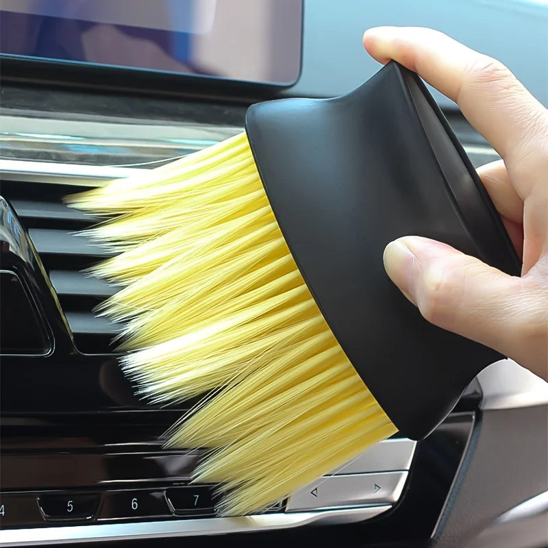 2-in-1 car interior cleaning brush with soft yellow and hard black bristles, suitable for dashboard, vents, and button details