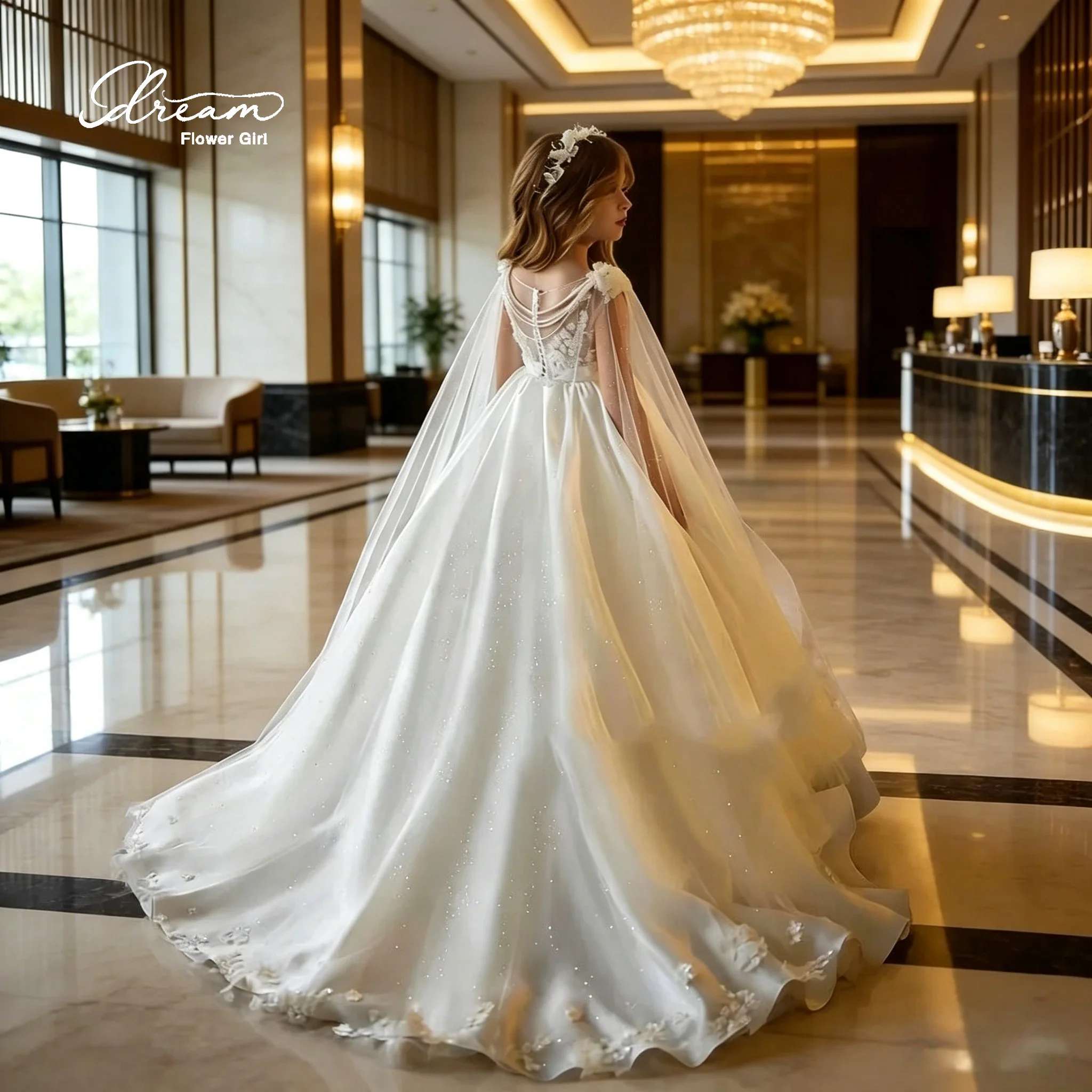 Elegant white floor-length net-sheer off-shoulder evening gown, with appliquéd and studded crystal sequins
