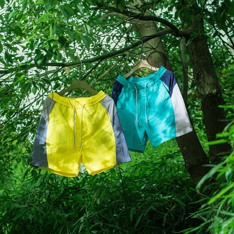 

Спортивные шорты для бега, мужские модные брендовые эластичные брюки с цветными блоками и шнурком, пять четвертей для мужчин и женщин