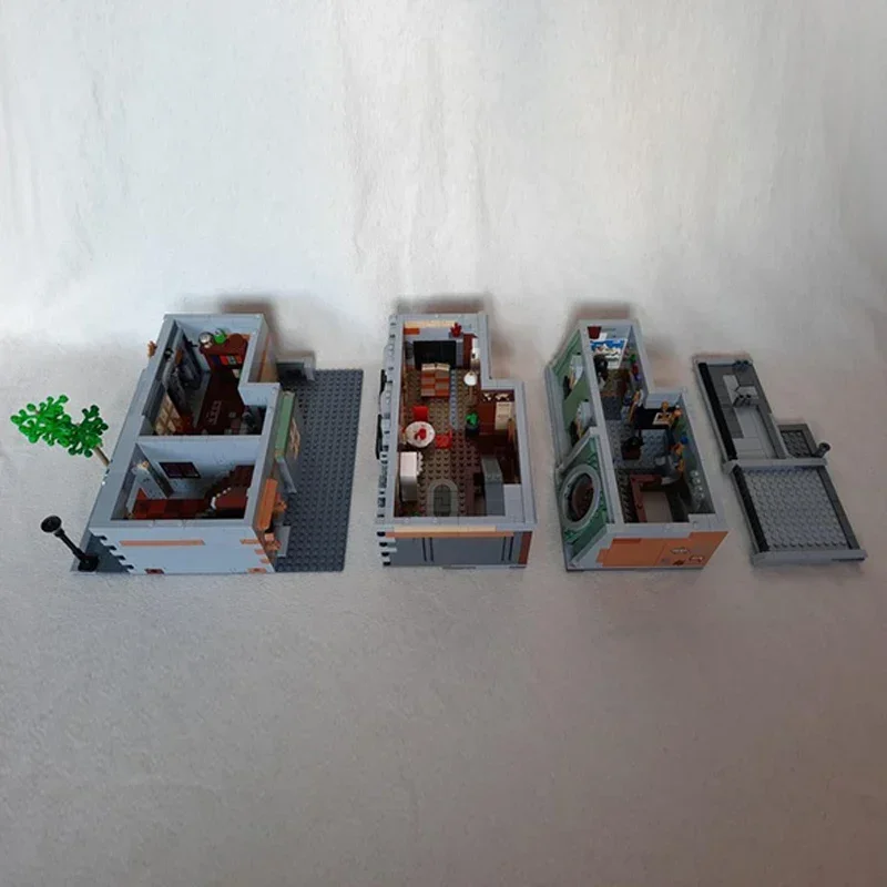Model Film Populer MOC Bangunan Bata Rumah Pahlawan Toko Kelontong Hijau Hadiah Teknologi Modular Setelan Mainan Rakitan Liburan Anak-anak