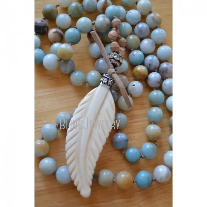 NM23760 Boho Chic Knot  Beads Necklace for Women with Cream Bone Feather Pendant Designer Jewelry