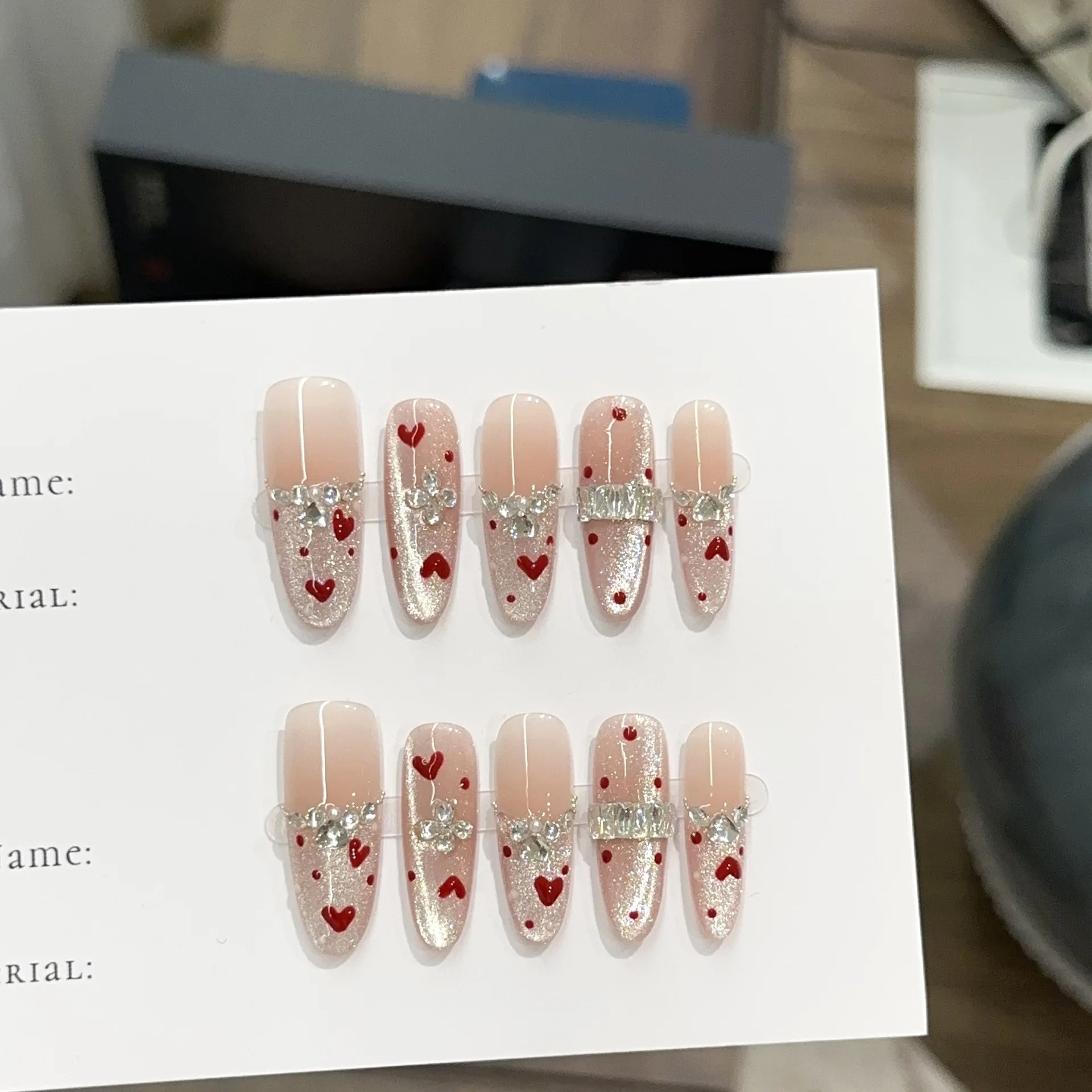 

10pcs Nude Pink Handmade Nails Long Coffin False Nails with Red Heart&3D Rhinestone Decor, Glossy Full Cover Acrylic Fake Nails