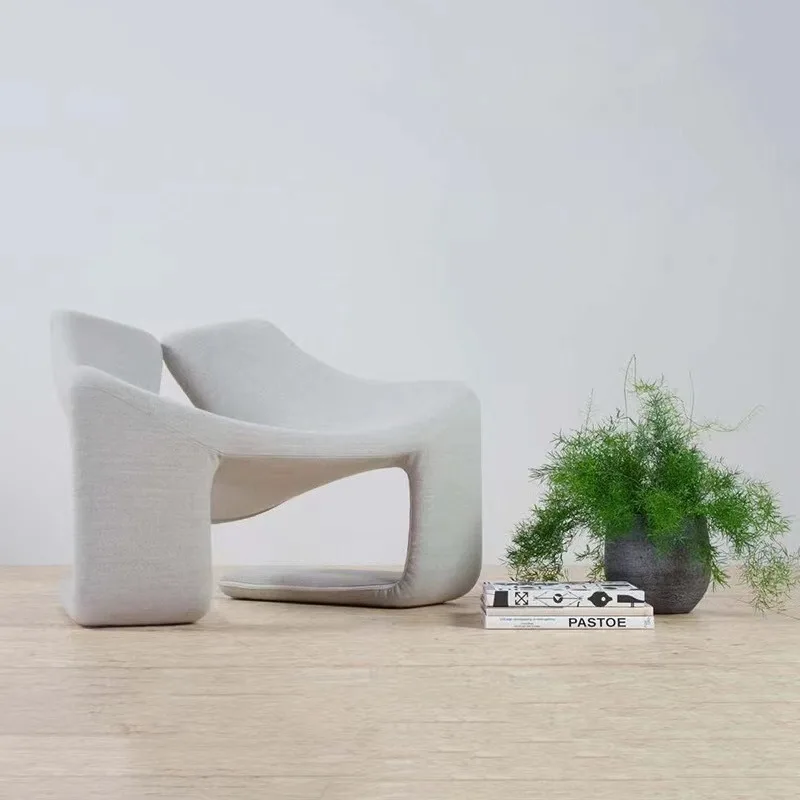 Designers' leisure chair glass fiber reinforced plastic hollowed-out special-shaped fabric single chair creative art living