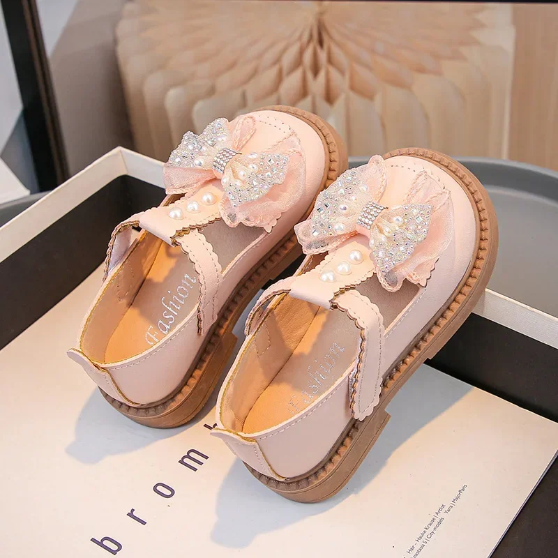 Girls Leather Shoes T-strap Shiny Sweet Bows 2025 Fashion Kids Flat Shoes Non-slip Soft Sole Children Princess Shoes Round Toes