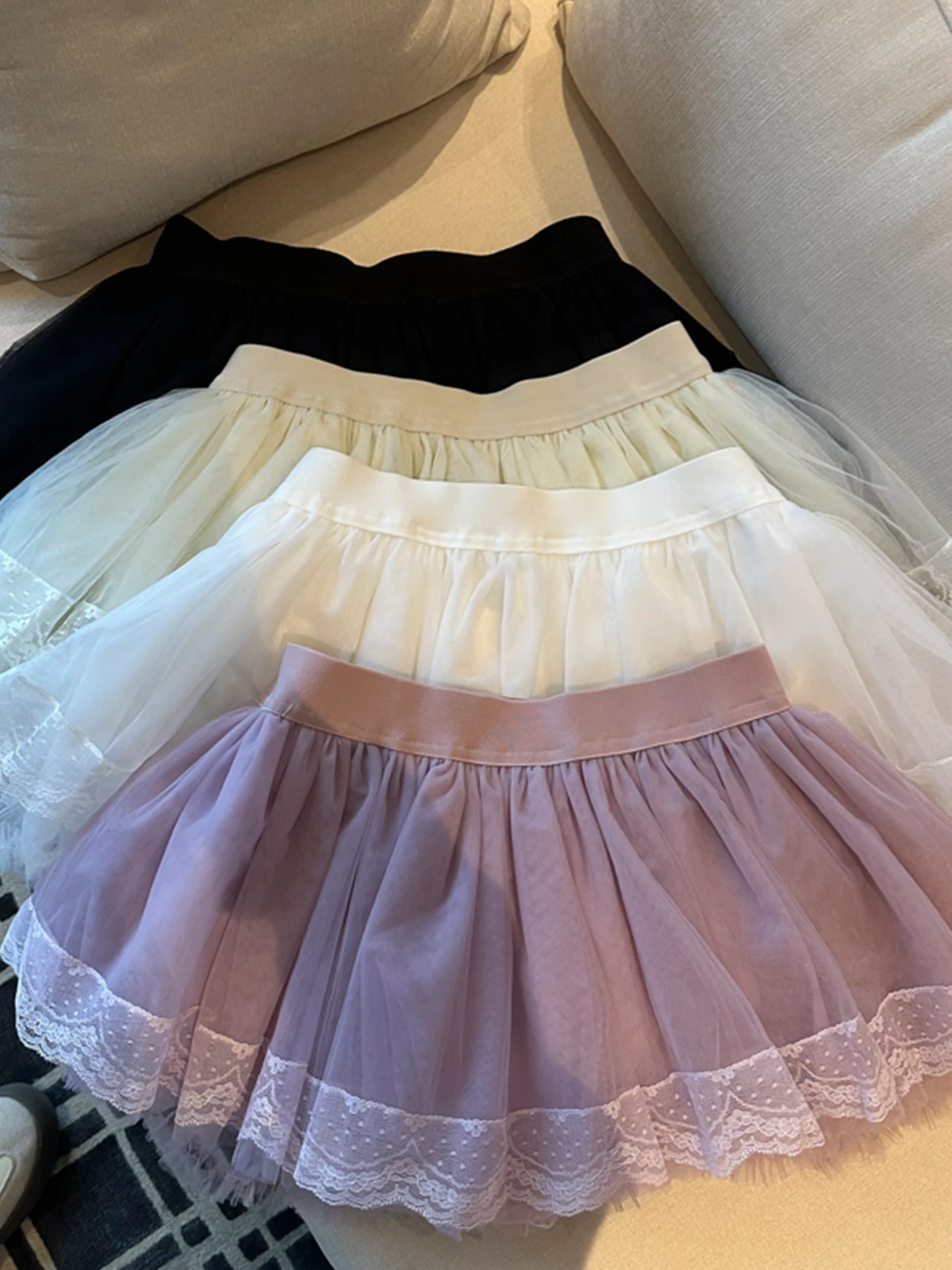 

Рекомендованная Эмили Клуд: Женская короткая юбка А-силуэта с кружевной отделкой, пышная, многоярусная, с высокой талией, повседневная, весна-лето