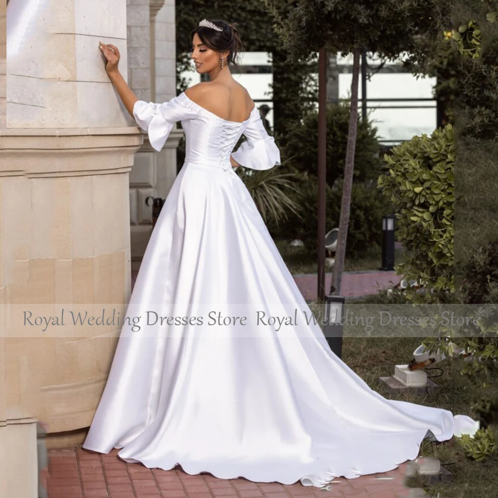 فستان زفاف من الساتان الأبيض للعروس فساتين زفاف على شكل حرف A قبالة الكتف نصف كم بأربطة فستان الزفاف مع ذيل