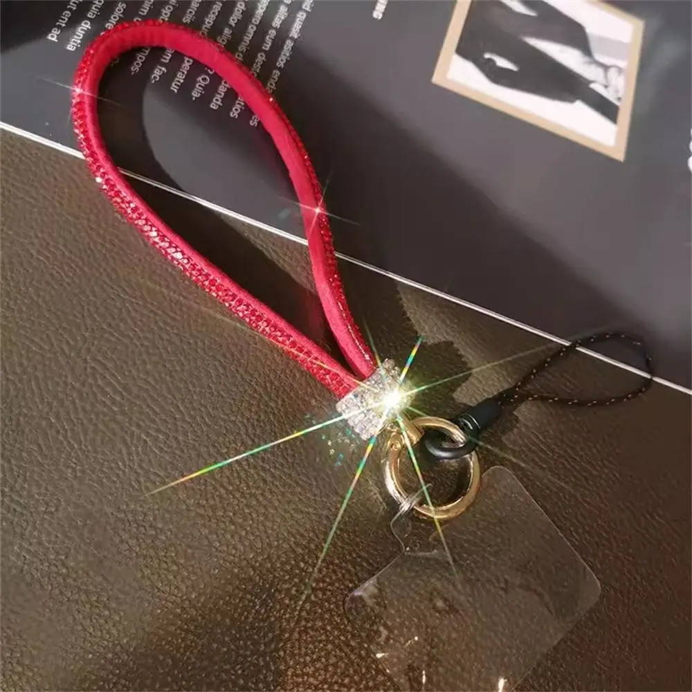 

Ремешок для мобильного телефона со стразами, блестящий ремешок для телефона с защитой от потери, роскошный яркий ремешок с бриллиантами, подвесные украшения