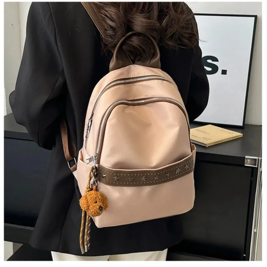 

New fashion generous shoulder bag Korean version of the flow college style nylon casual simple schoolbag rivets small backpacks