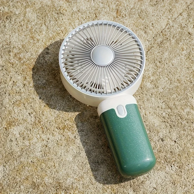 مروحة كهربائية محمولة باليد ذات طراز محايد بسيط بثلاث سرعات مع قاعدة قابلة للفصل، يمكن أن تحملها والوقوف، مدمجة ومحمولة