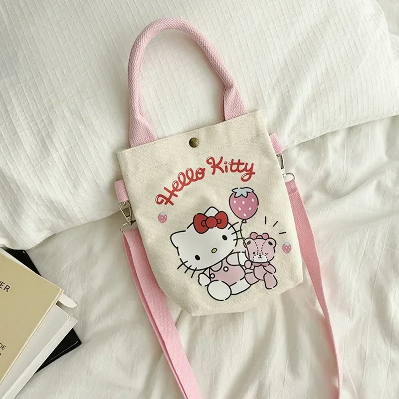 Sanrio Hello Kitty Cinnamoroll อนิเมะ Kawaii INS กระเป๋าผ้าใบแฟชั่นน่ารักเมโลดี้ท่องเที่ยวแบบสบายๆกระเป๋าถือใส่ของของขวัญของเล่น