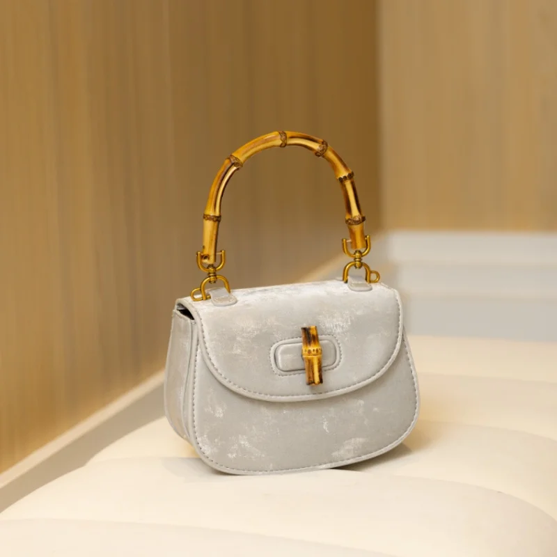 

Women's fashion personalized handbag versatile simple handbag bamboo handle handle